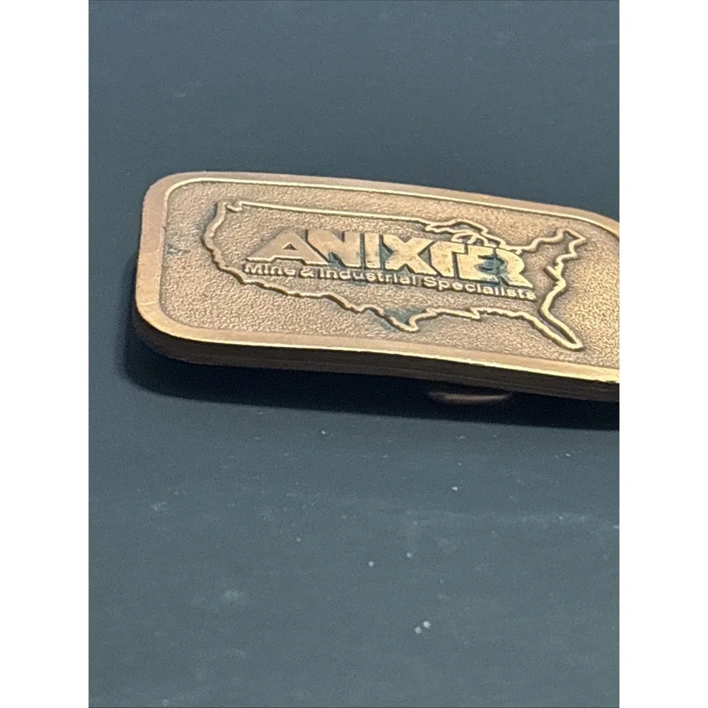 Vintage Anixter Mine & Industrial Specialists Brass Belt Buckle Hit Line USA